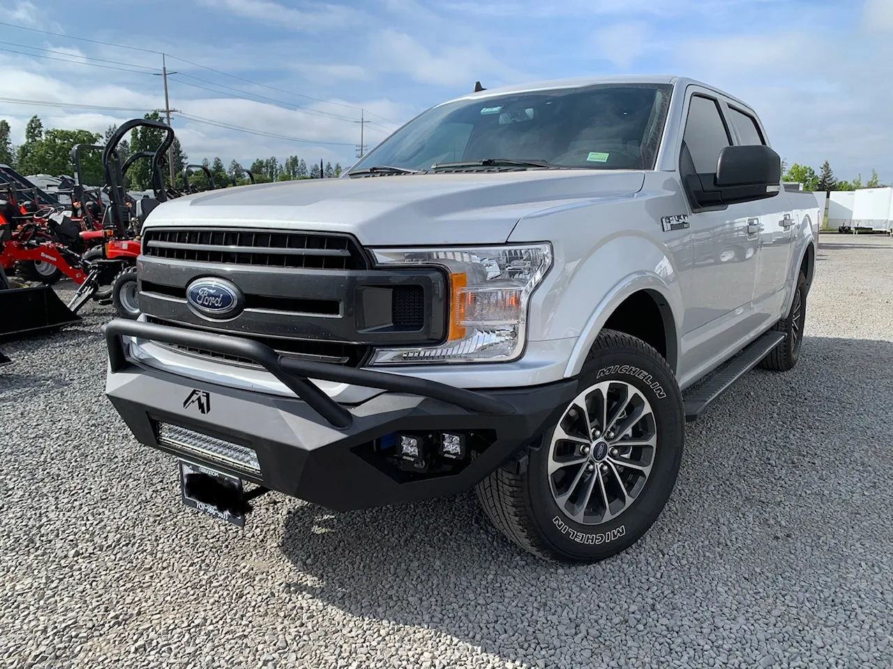 front tow hitch attached to ford truck
