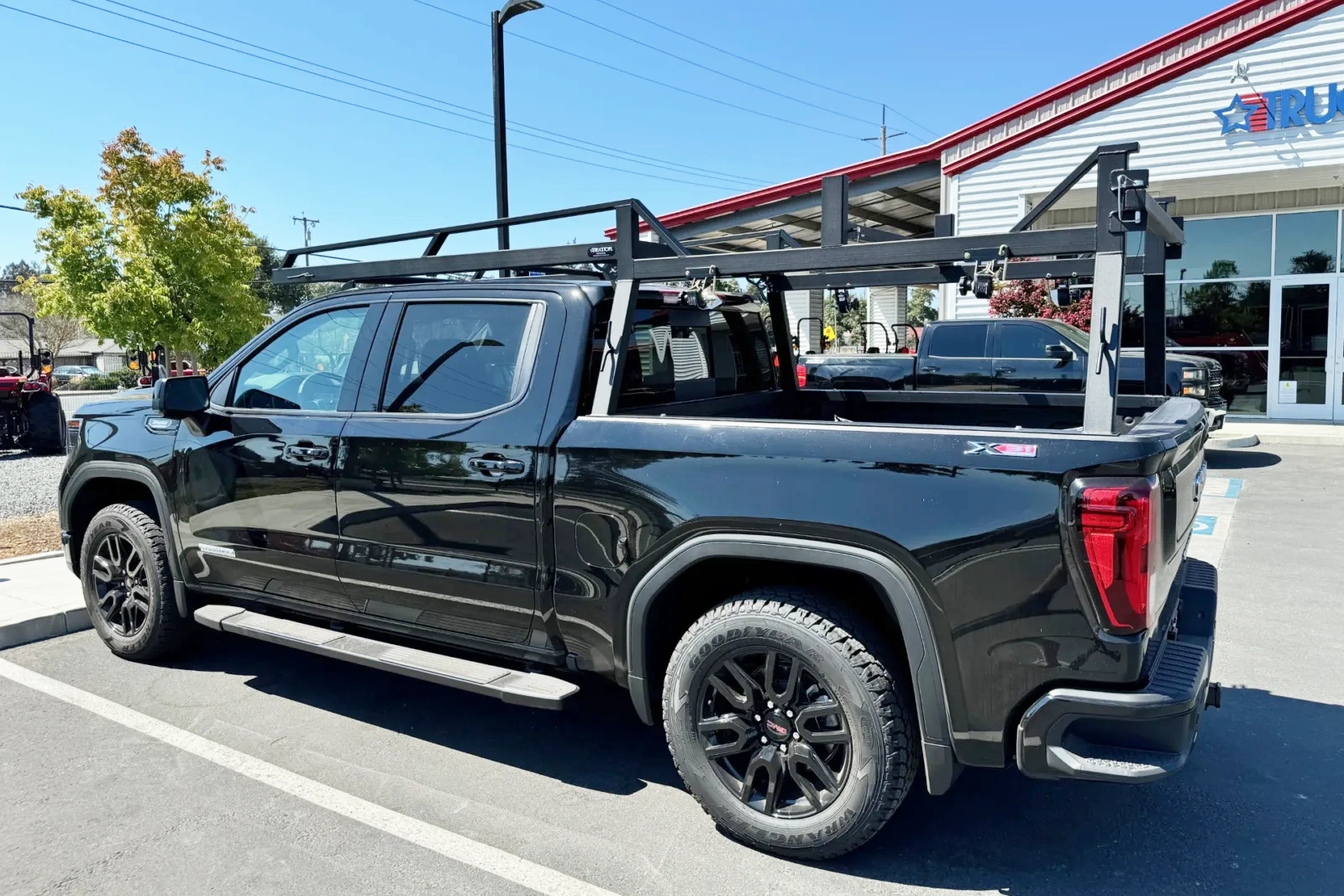 The back of a work truck equipped with Campway's Extreme Duty truck rack