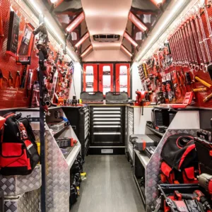 A very well organized commercial work can, and mobile workshop van with organized shelving units, drawer systems, and various work tools and other gear